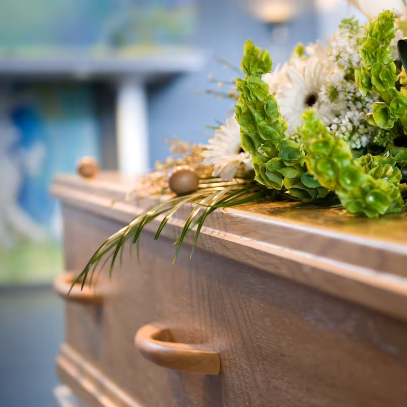 Traditional funeral service showing a beautifully arranged chapel setting